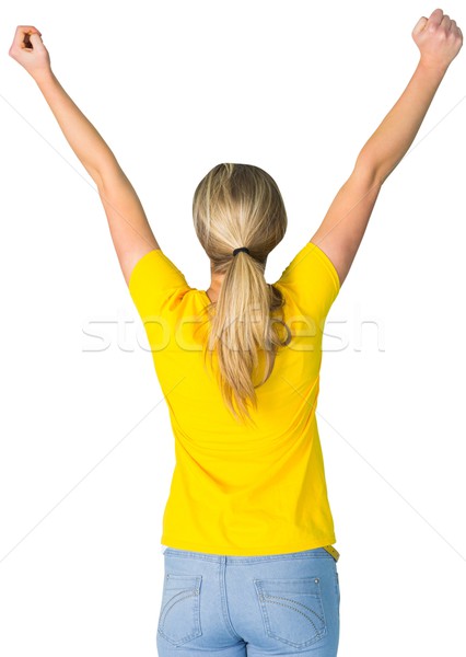 Excited football fan in brasil tshirt Stock photo © wavebreak_media