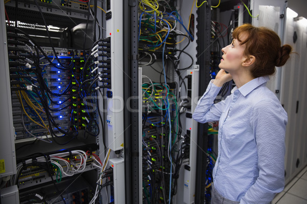 Technician talking on phone while analysing server Stock photo © wavebreak_media