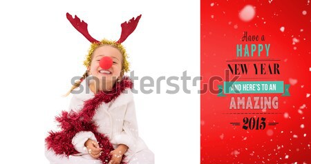 Cute little girl wearing red nose and tinsel Stock photo © wavebreak_media