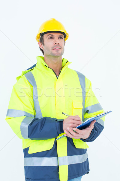 Homme architecte écrit presse-papiers blanche [[stock_photo]] © wavebreak_media