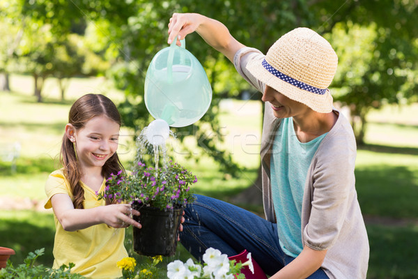 Happy blonde and her daughter gardening  Stock photo © wavebreak_media