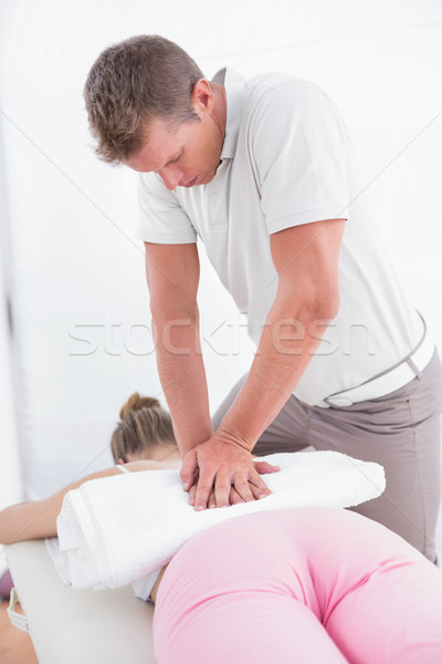 Physiotherapist doing back massage  Stock photo © wavebreak_media