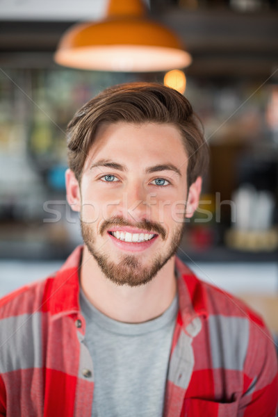Portret glimlachend jonge man pub partij man Stockfoto © wavebreak_media
