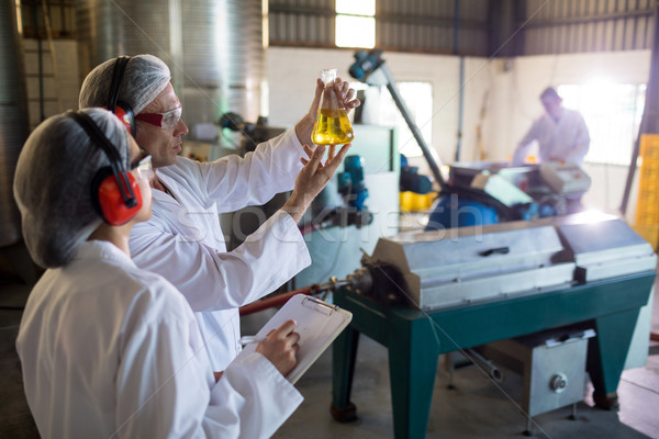 Technicians examining olive oil Stock photo © wavebreak_media