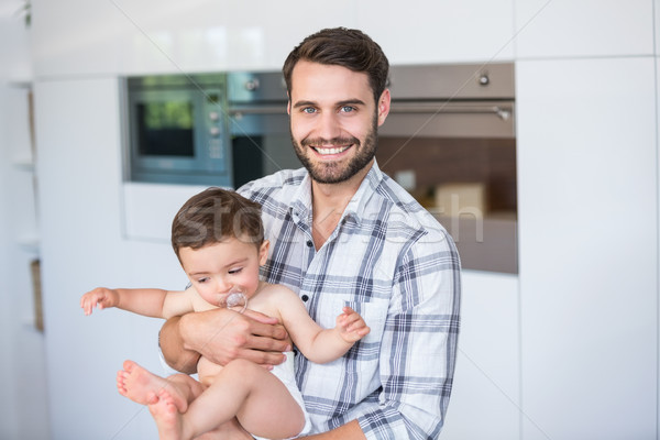 Heureux homme fils maison portrait [[stock_photo]] © wavebreak_media