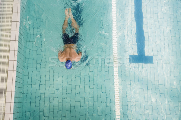 Swimmer doing the breaststroke in swimming pool Stock photo © wavebreak_media