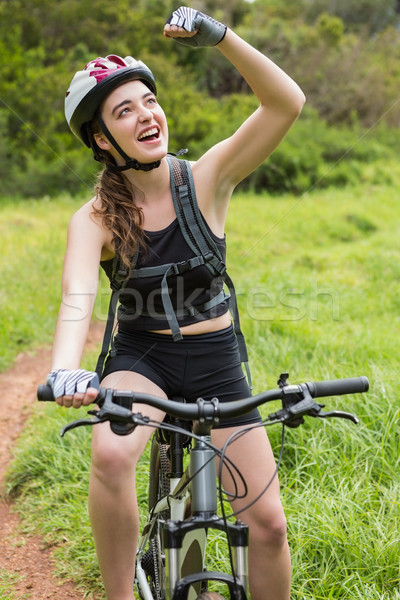 Smiling woman cycling Stock photo © wavebreak_media