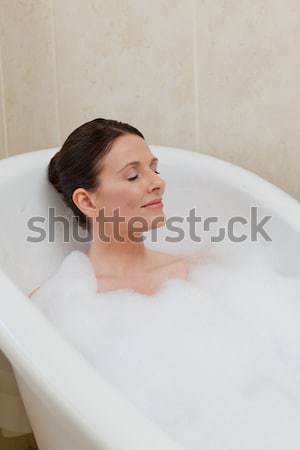 Cheerful attractive woman in a bubble bath Stock photo © wavebreak_media