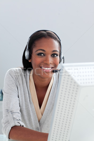 Imprenditrice auricolare ufficio donna faccia Foto d'archivio © wavebreak_media