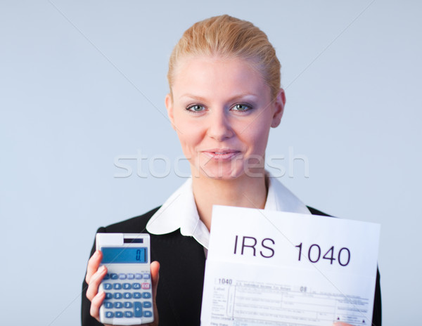 充填 税 ビジネス女性 見える コンピュータ 紙 ストックフォト © wavebreak_media