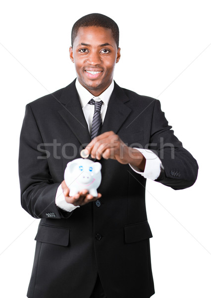 üzletember pénz persely fiatal mosolyog kamera Stock fotó © wavebreak_media