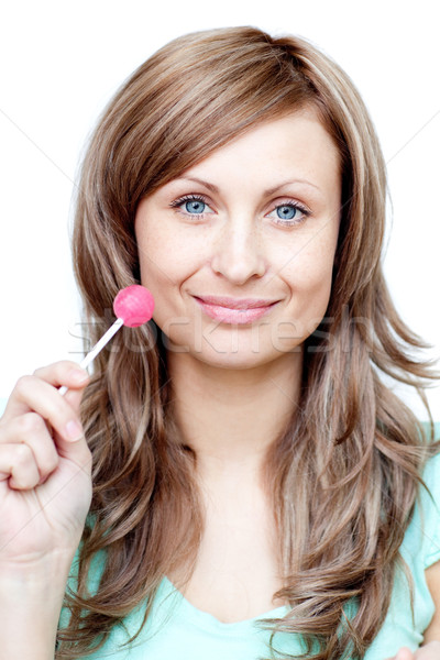 Serious woman holding a lollipop  Stock photo © wavebreak_media