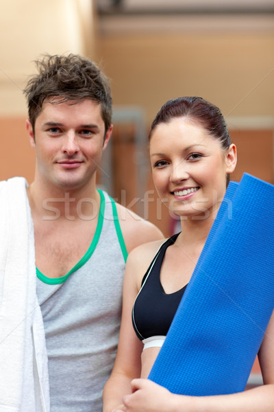portrait of a happy couple after fitness exercices smiling to the camera in a fitness centre  Stock photo © wavebreak_media