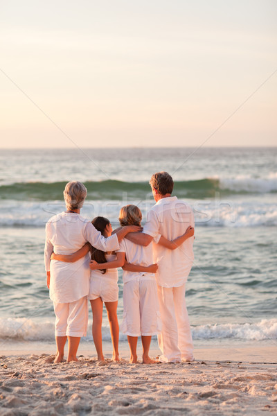 Stockfoto: Portret · aanbiddelijk · familie · strand · hemel