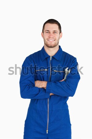 Stock foto: Lächelnd · Mechaniker · Anzug · gefaltet · Arme · weiß