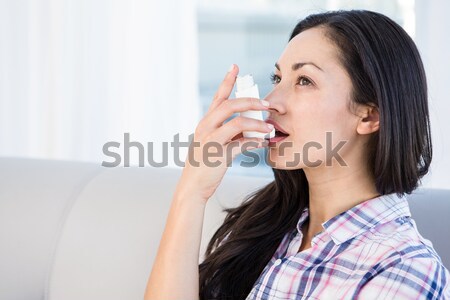 Portrait of a woman drinking water in her kitchen Stock photo © wavebreak_media