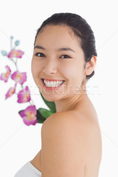 Stock photo: Smiling natural beauty with orchids