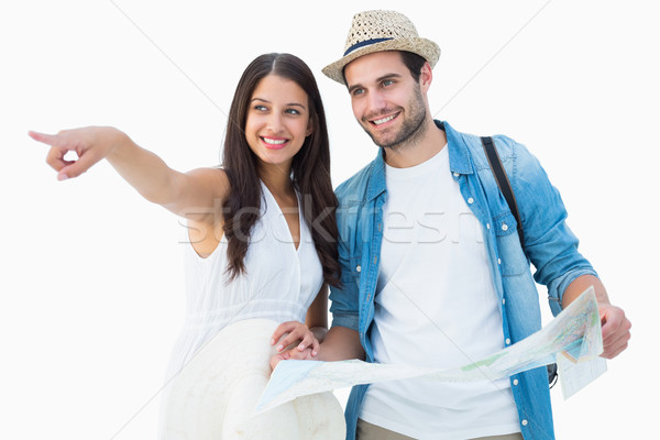 Happy hipster couple looking at map Stock photo © wavebreak_media