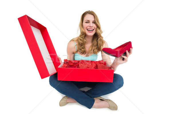 Souriant jeune femme nouvelle chaussures blanche [[stock_photo]] © wavebreak_media
