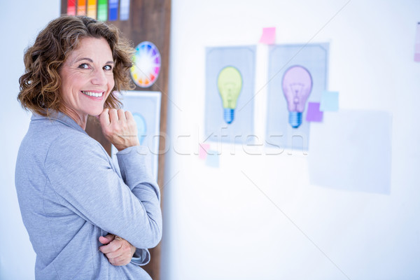 Creative businesswoman looking at camera  Stock photo © wavebreak_media