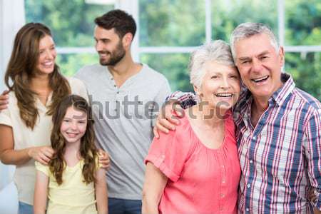 Happy family with two children playing video games Stock photo © wavebreak_media