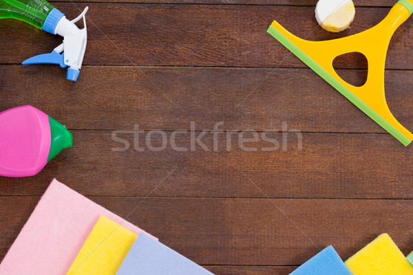 Cleaning equipments arranged on wooden floor Stock photo © wavebreak_media