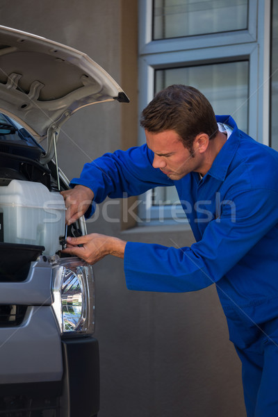 Mechanic examining the car Stock photo © wavebreak_media