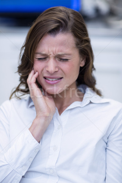 Vrouw lijden kiespijn tandheelkundige kliniek triest Stockfoto © wavebreak_media