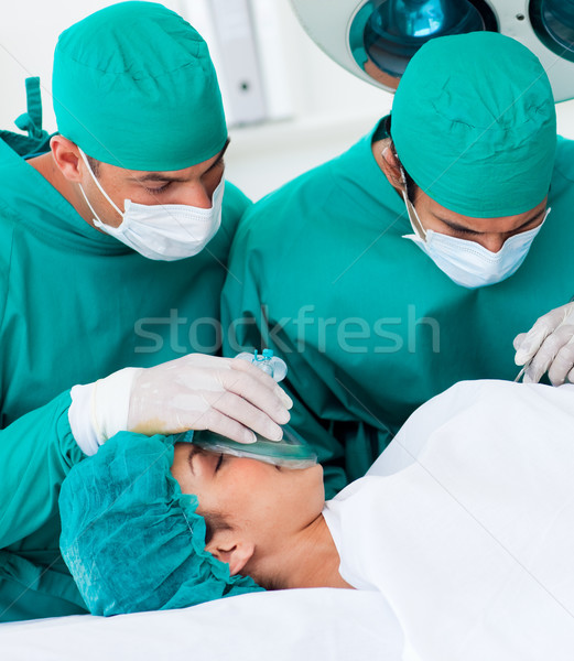 Közelkép sebészek beteg asztal kórház férfi Stock fotó © wavebreak_media