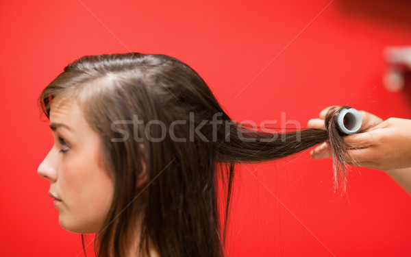 Hands rolling hair with a curler Stock photo © wavebreak_media