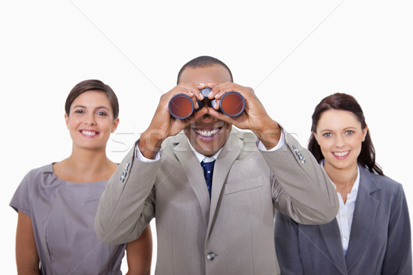Biznesmen koledzy patrząc lornetki biały tle Zdjęcia stock © wavebreak_media