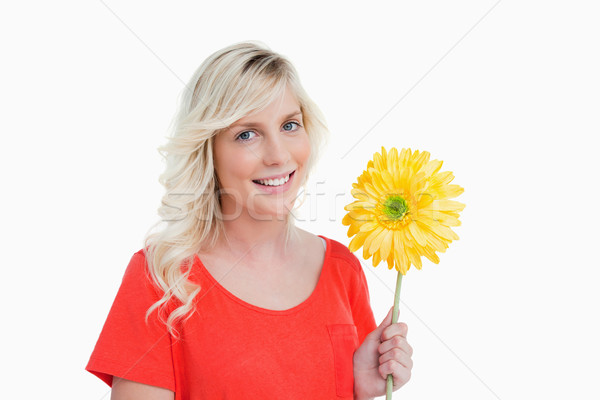 Souriant jeune femme fleur jaune blanche printemps [[stock_photo]] © wavebreak_media