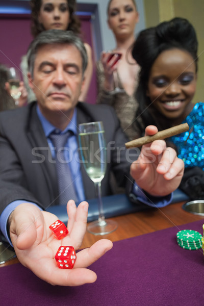 Man playing craps in casino Stock photo © wavebreak_media