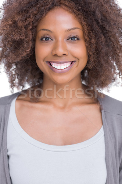 Portrait of smiling brunette woman standing  Stock photo © wavebreak_media