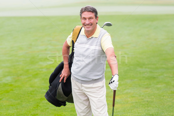 Bello golfista piedi sacca da golf giorno Foto d'archivio © wavebreak_media