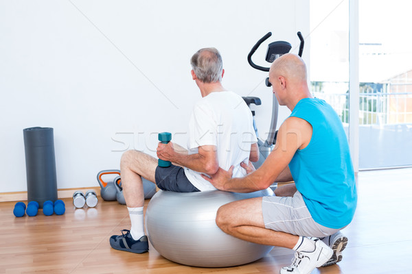 Yaşlı adam geri masaj egzersiz top tıbbi Stok fotoğraf © wavebreak_media