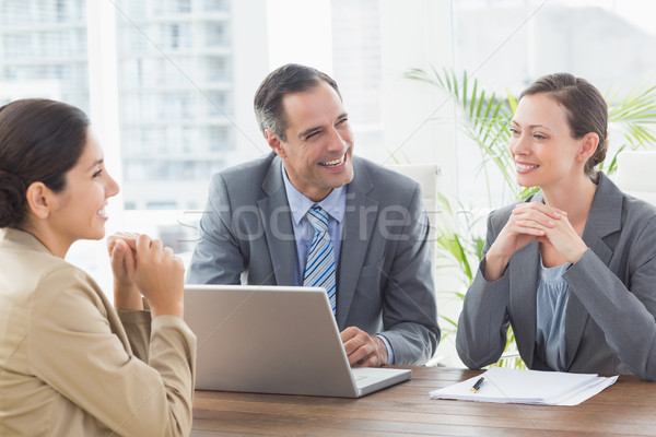 Gens d'affaires entrevue bureau homme portable technologie [[stock_photo]] © wavebreak_media