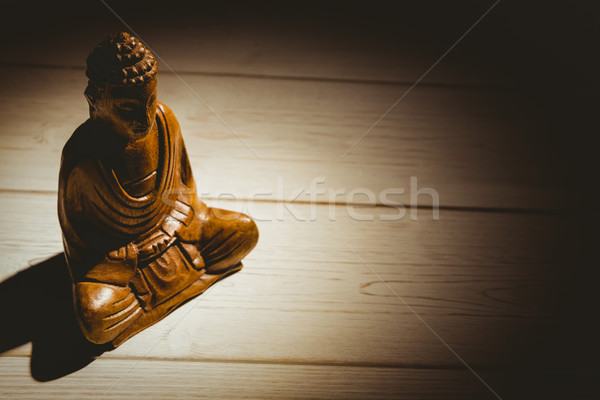 Buddha statue on a table Stock photo © wavebreak_media