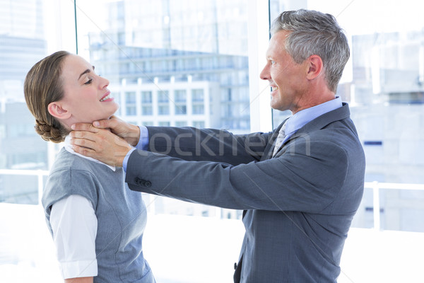 Businessman trying to smother his colleague Stock photo © wavebreak_media