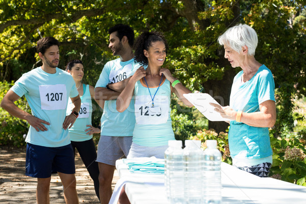 Athletes registering themselves for marathon Stock photo © wavebreak_media