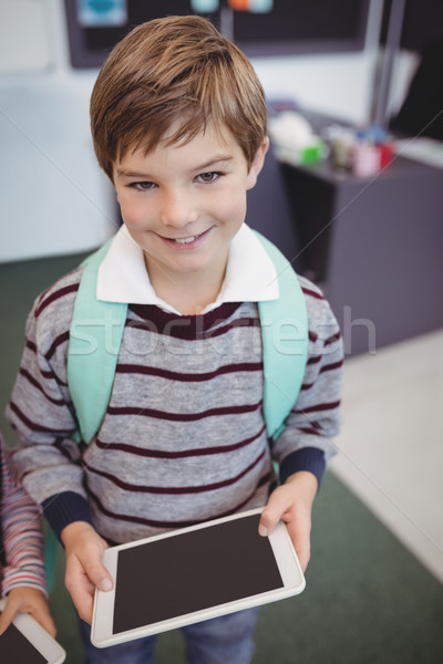 Portret cute schooljongen permanente digitale tablet Stockfoto © wavebreak_media