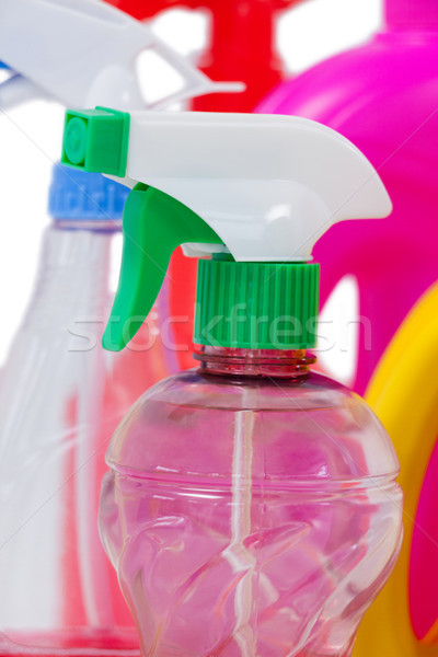 Detergent spray bottle and containers arranged on white background Stock photo © wavebreak_media