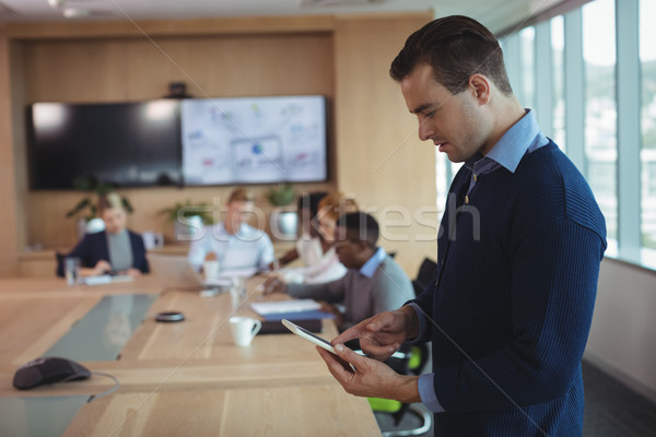 Young businessman using digital tablet Stock photo © wavebreak_media