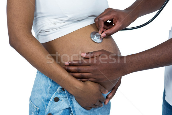 Doctor examining a pregnant woman Stock photo © wavebreak_media