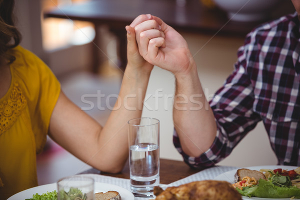 Stockfoto: Paar · holding · handen · vergadering · eettafel · vrouw · liefde