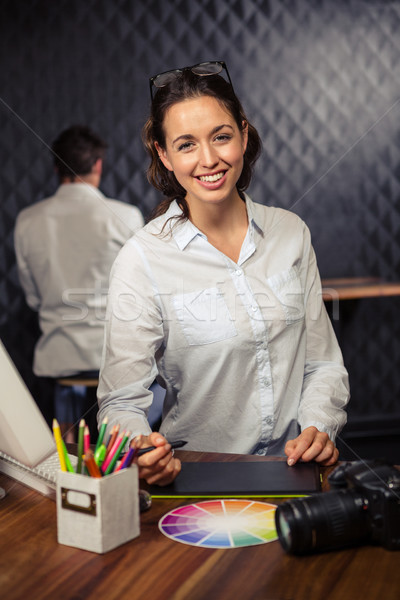 Creative femme d'affaires travail graphique comprimé bureau [[stock_photo]] © wavebreak_media