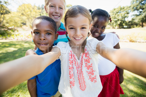 Enfants ensemble caméra parc [[stock_photo]] © wavebreak_media