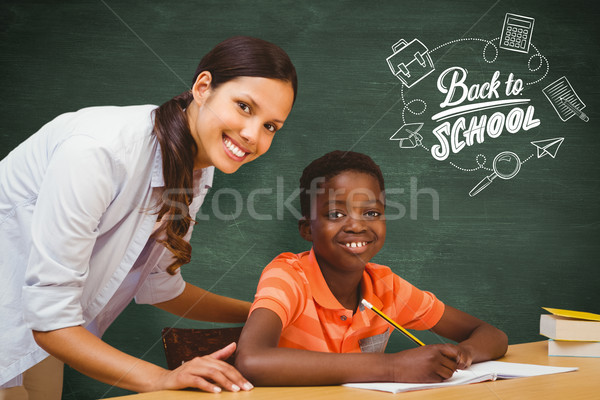Composite image of teacher assisting boy with homework in librar Stock photo © wavebreak_media