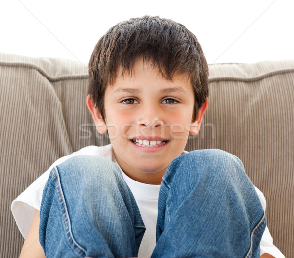 Portrait of a happy child relaxing on the sofa at home Stock photo © wavebreak_media