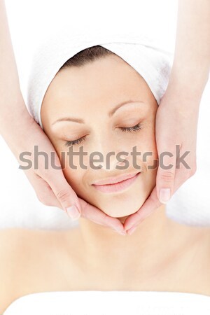 Pretty dark-haired woman getting a spa treatment lying down Stock photo © wavebreak_media